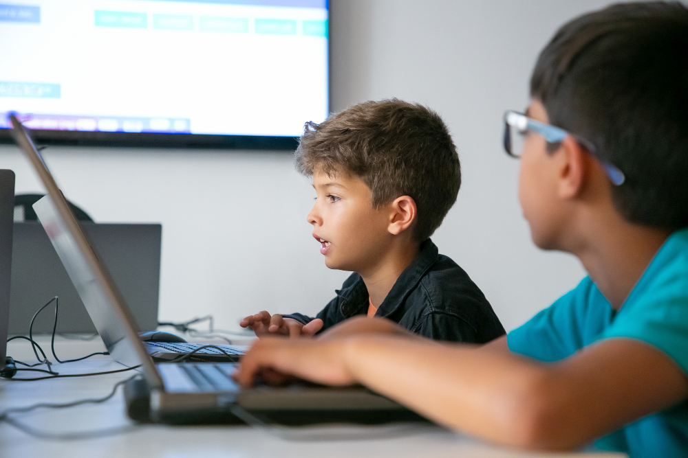 Header image: Child debugging code