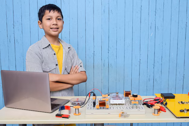 Header image: Student thinking while adjusting a robotics project