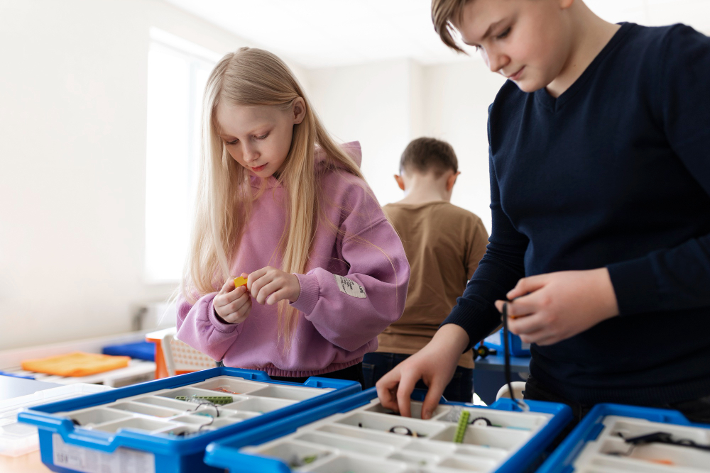 Photo: Students designing and testing unique contraptions with everyday materials