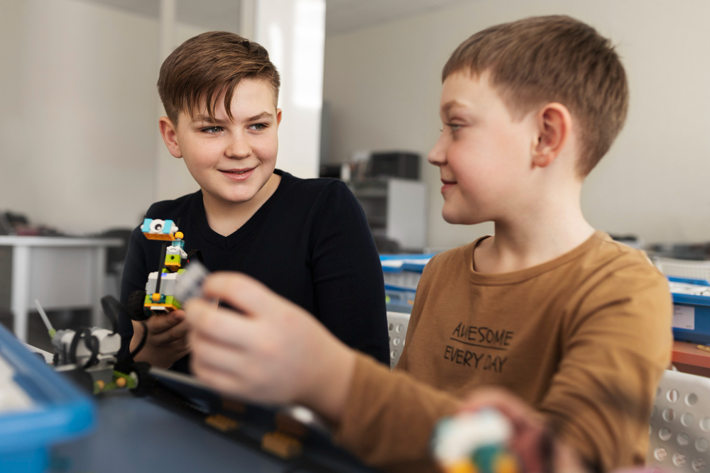 Photo: Kids laughing and testing small science experiments together